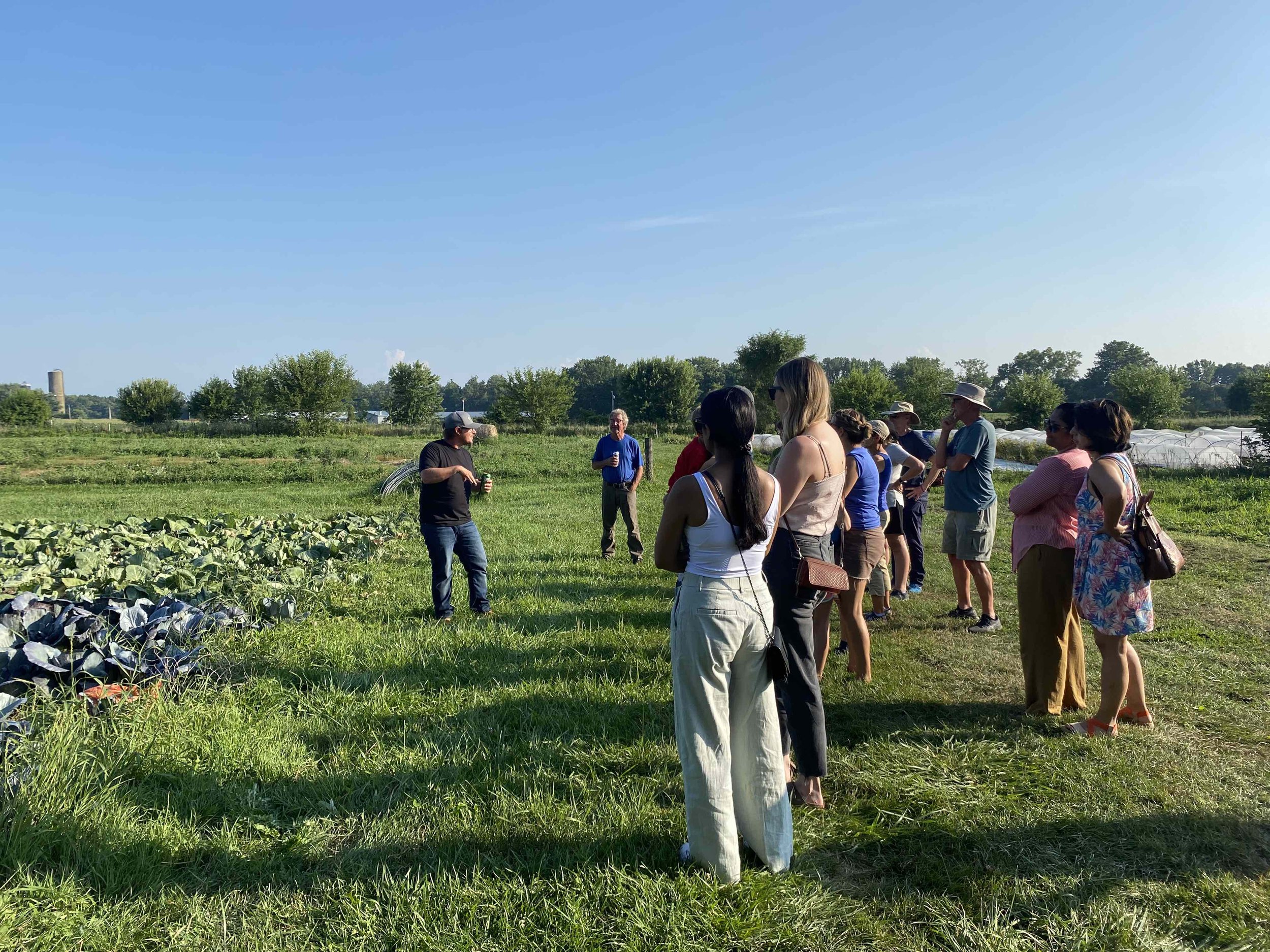 Zach Hawkins discussing farm growing techniques.jpg